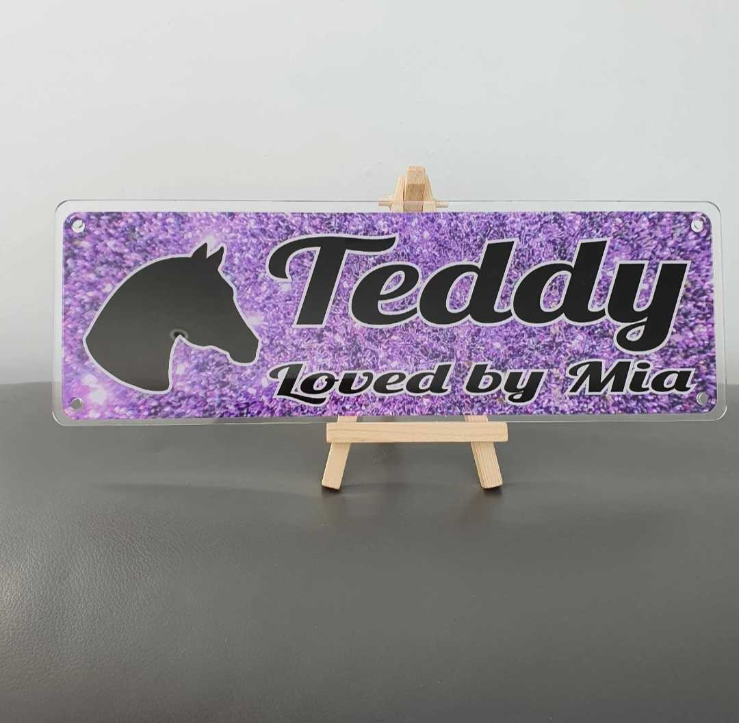 Teddy Design Purple Glitter Style Background with Black Text